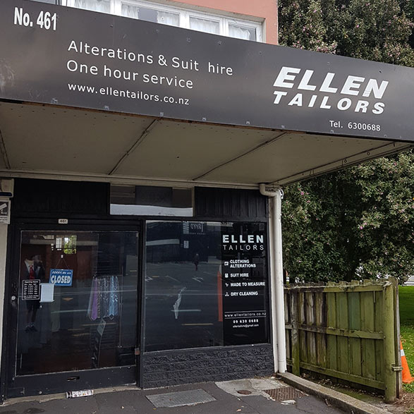 Gray Car in front of the Balmoral Drycleaners Store
